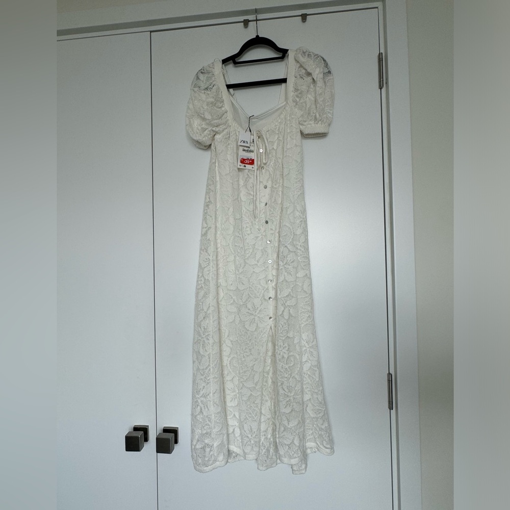 Never worn before Ivory lacy dress